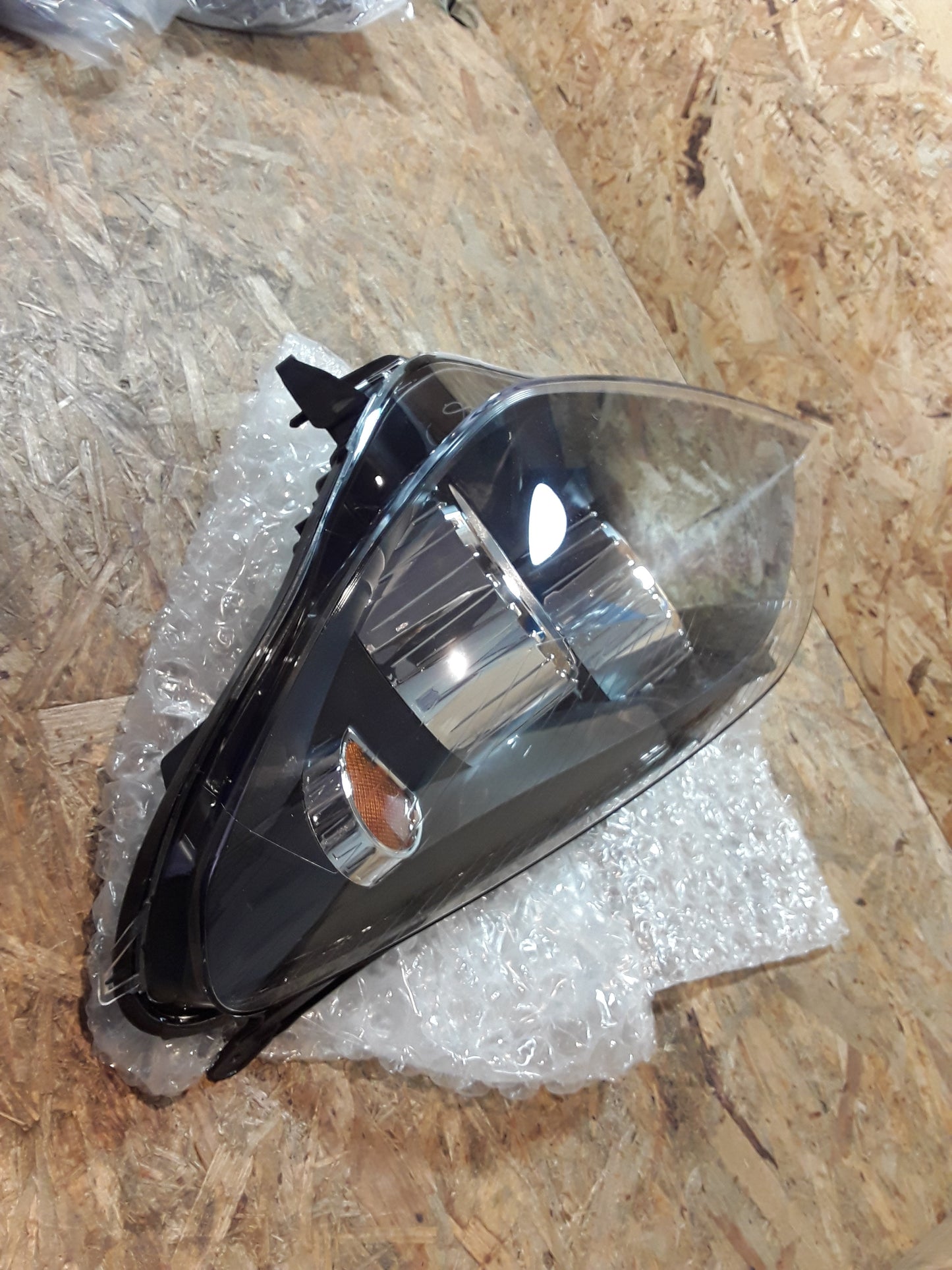 Astra H Scheinwerfer links original GM Opel NEU