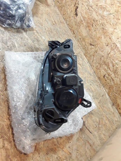Astra H Scheinwerfer links original GM Opel NEU