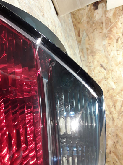 Astra H GTC Rückleuchte rechts (leichte Kratzer, siehe Bild) original GM Opel NEU