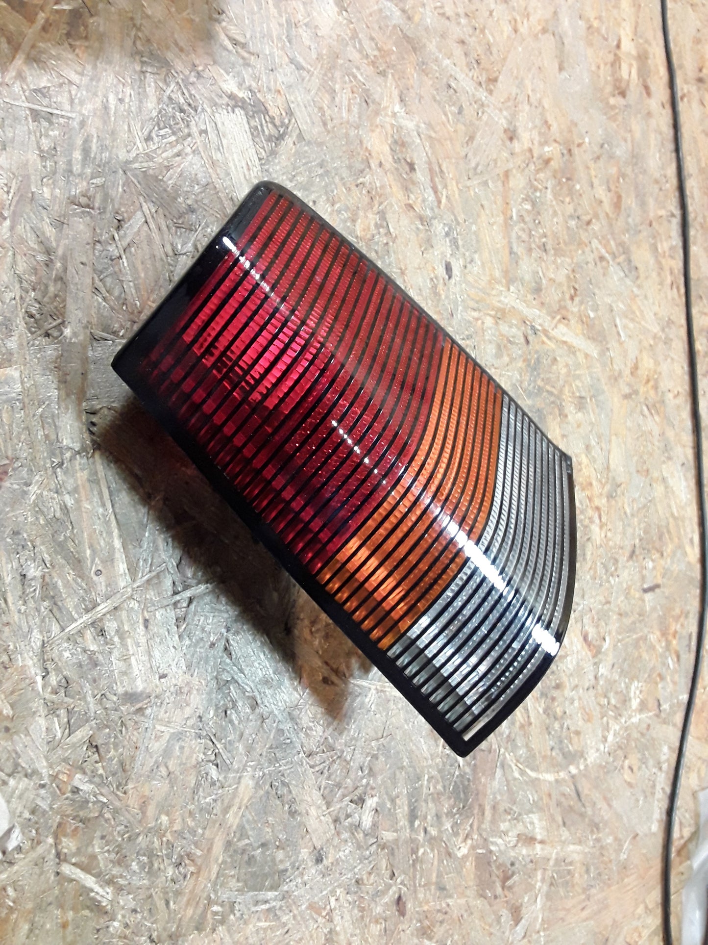 Kadett E Rückleuchte links dunkel original GM Opel NEU