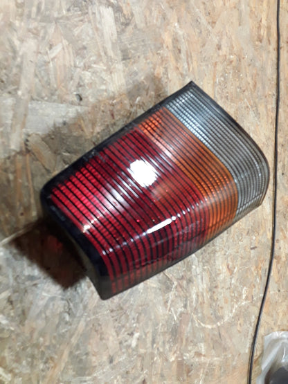 Kadett E Rückleuchte links dunkel original GM Opel NEU