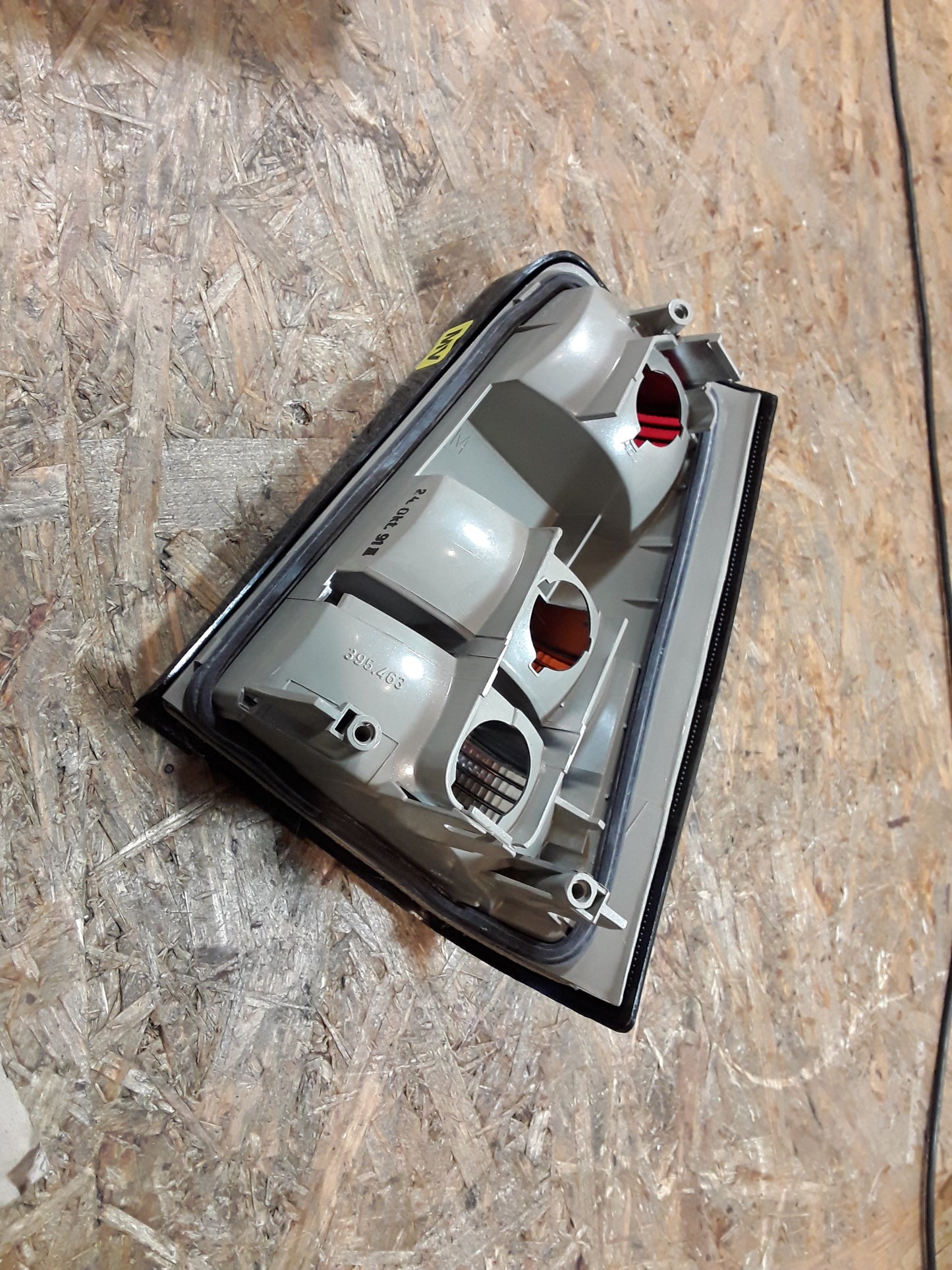 Kadett E Rückleuchte links dunkel original GM Opel NEU