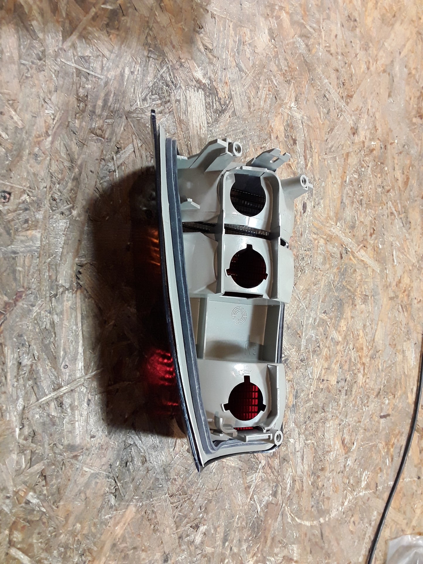 Kadett E Rückleuchte links dunkel original GM Opel NEU