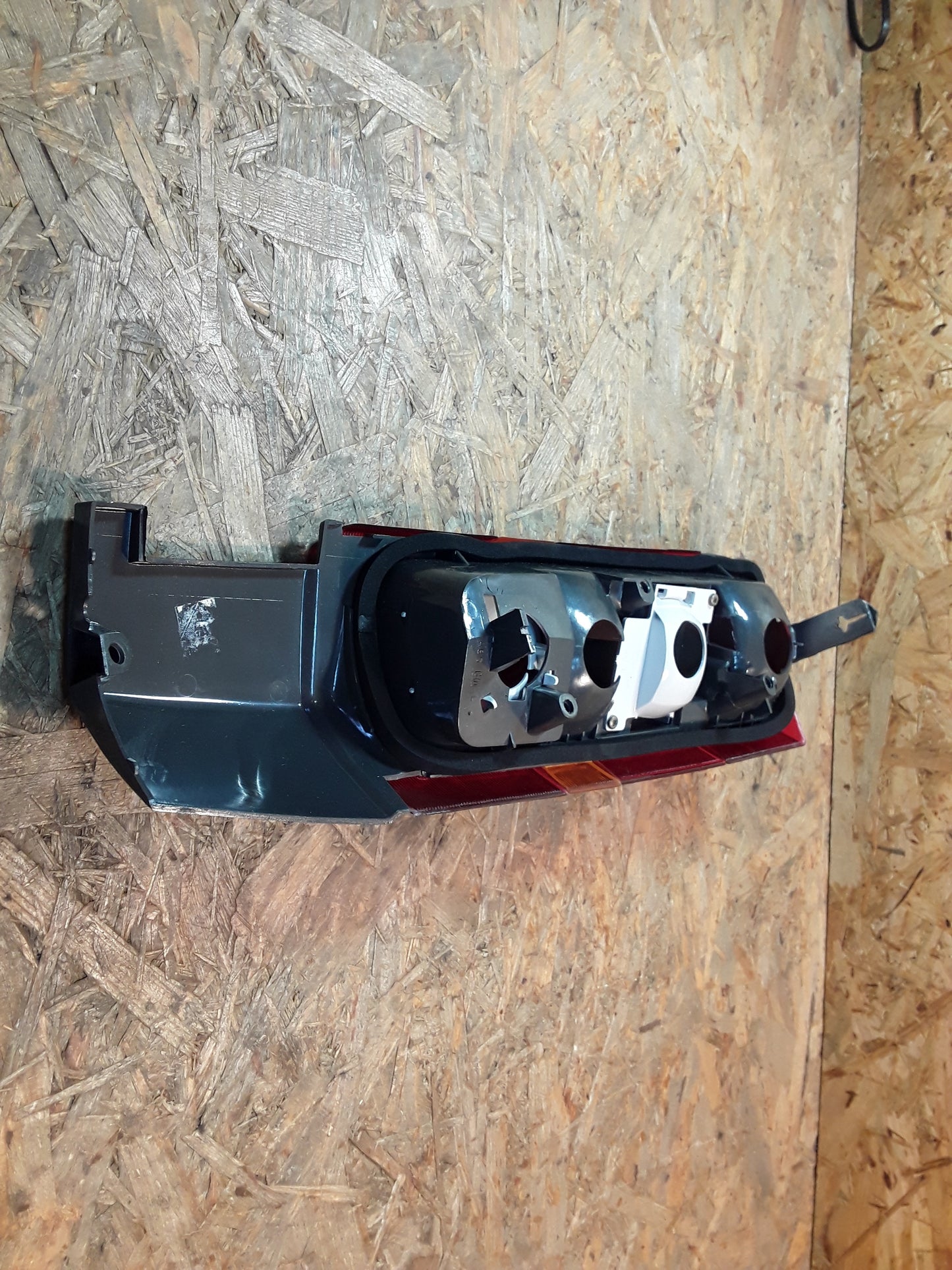 Kadett E Heckleuchte links original GM Opel NEU