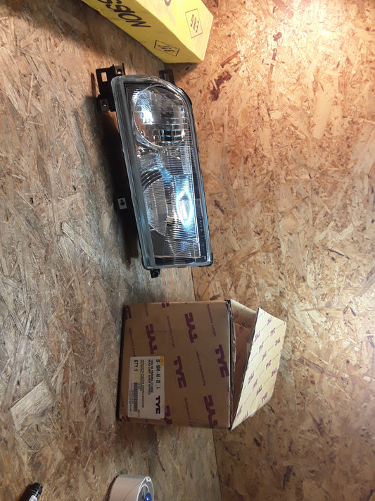 Nissan Primera 1990 Bj Scheinwerfer links original TYC NEU