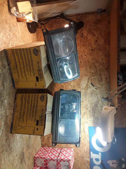 Original Hella Mercedes W123 H4 Satz Hauptscheinwerfer links und rechts original Hella NEU
