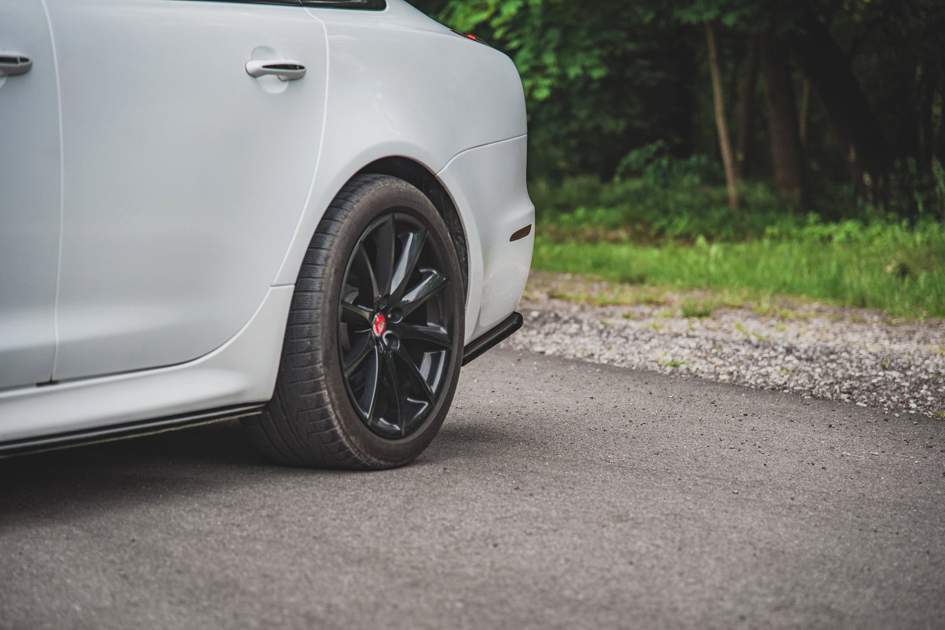 Heck Ansatz Flaps Diffusor für Jaguar XJ X351 schwarz Hochglanz