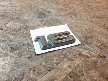 Original GM Opel Schiftzug Emblem 1,6 chrom/grau selbstklebend 90227230 Ascona C