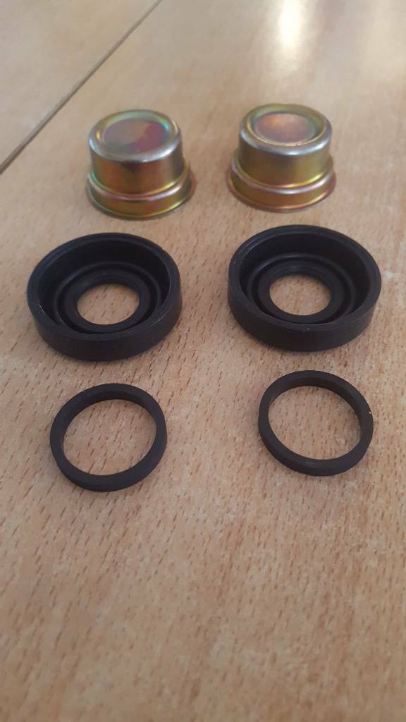Kadett E Omega A Bremssattel Hülsen Reperaturkit neu original GM