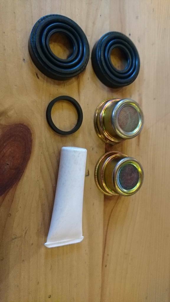 Kadett E Omega A Bremssattel Hülsen Reperaturkit neu original GM