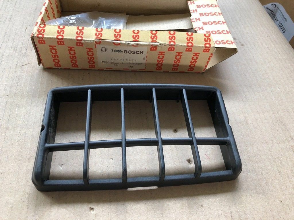Original Bosch Scheinwerfer Gitter Abdeckung *NEU*