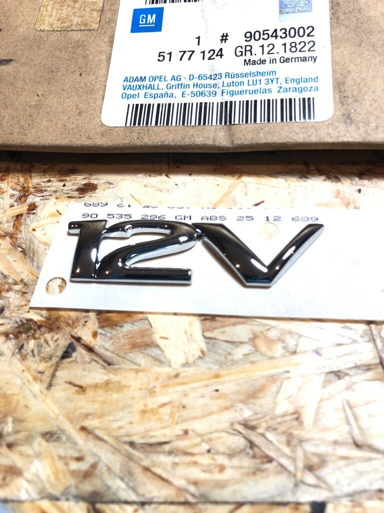 Original GM Opel 12V Emblem Klebend *NEU* 90543002