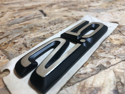 Original GM Opel 2.5 Emblem Schriftzug Neu
