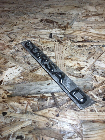 Original GM Opel Corsa D Emblem Schriftzug klebend Neu