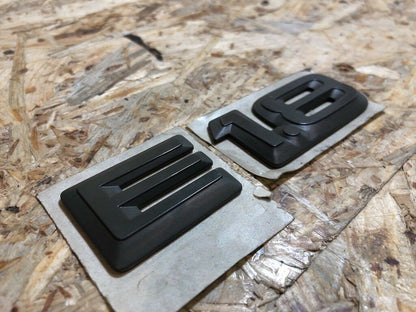 Original GM Opel E 1.8 Emblem Schriftzug klebend *NEU*