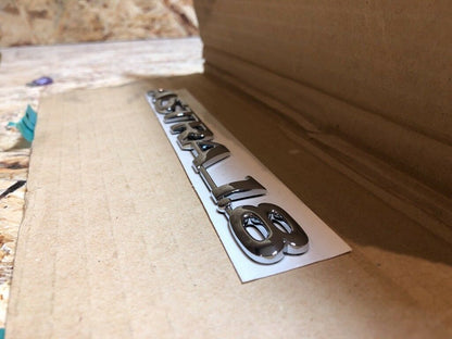 Original GM Opel Astra 1.8 Emblem Schriftzug Neu