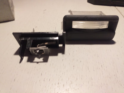 Kadett E 1 Nummernschildleuchte original GM Opel NEU