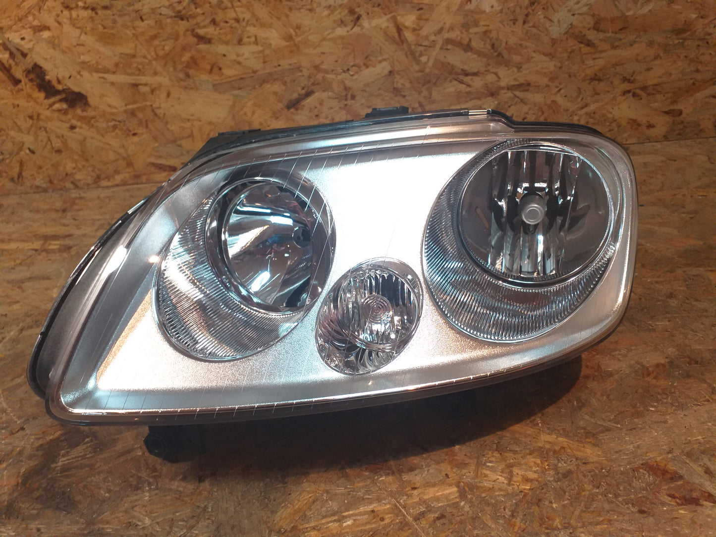VW Caddy Scheinwerfer links original Opel NEU