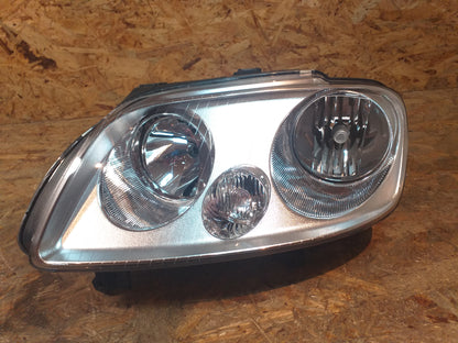 VW Caddy Scheinwerfer links original Opel NEU