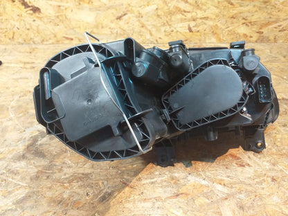 VW Caddy Scheinwerfer links original Opel NEU