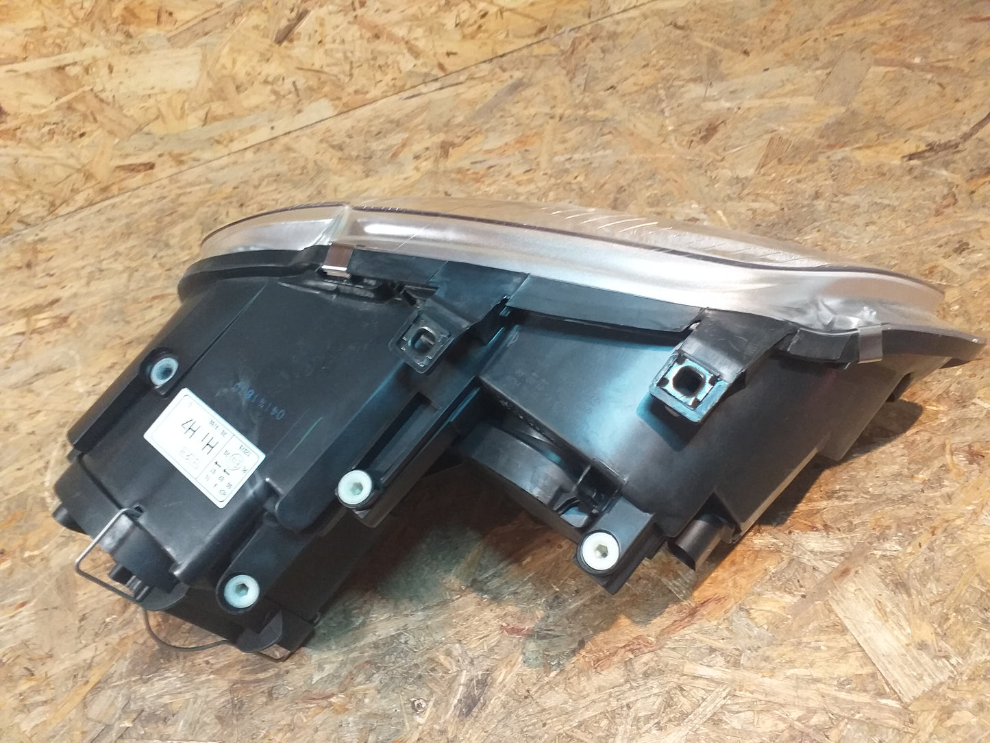 VW Caddy Scheinwerfer links original Opel NEU