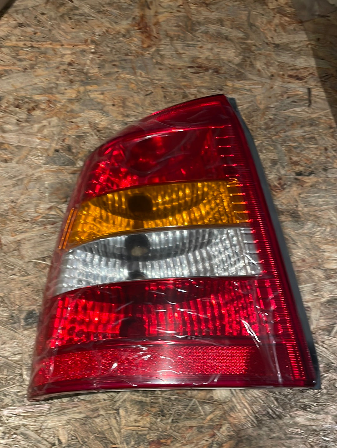 Original GM Opel Astra G Zafira A Heckleuchte mit Nebelschlussleuchte links Neu