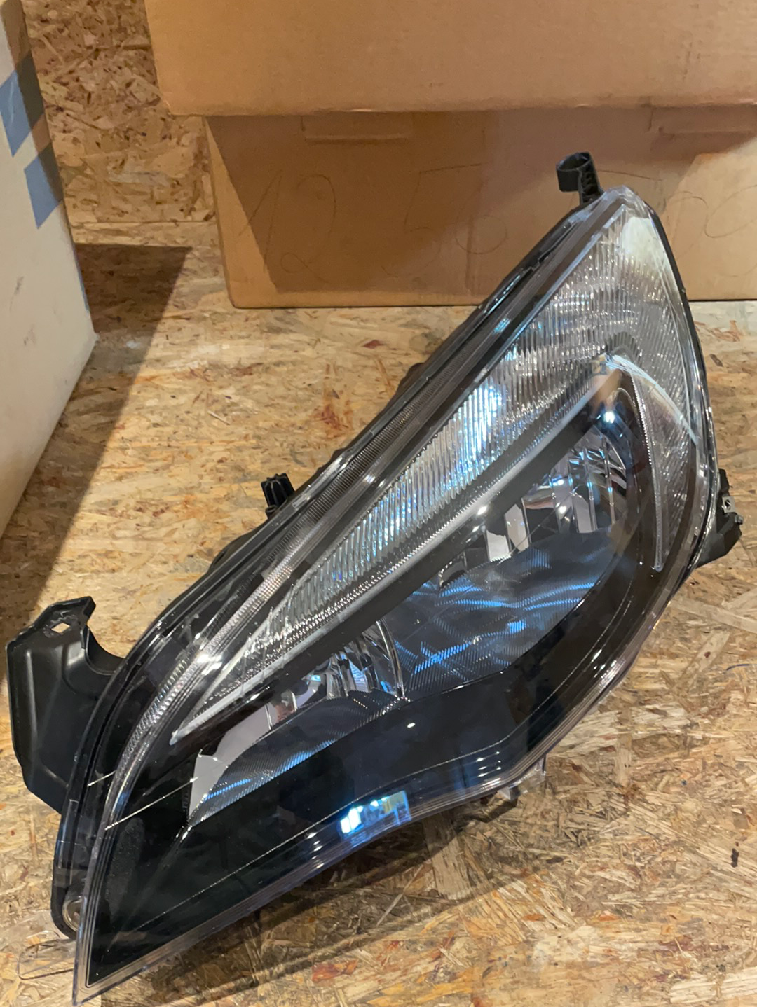 Original GM Opel Astra J Hauptscheinwerfer vorne links Halogen Neu